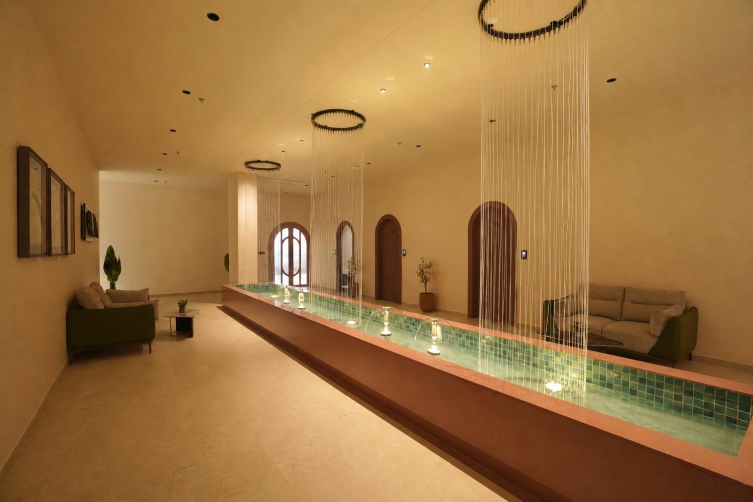 Serene spa hallway with water feature at Rivona International Spa