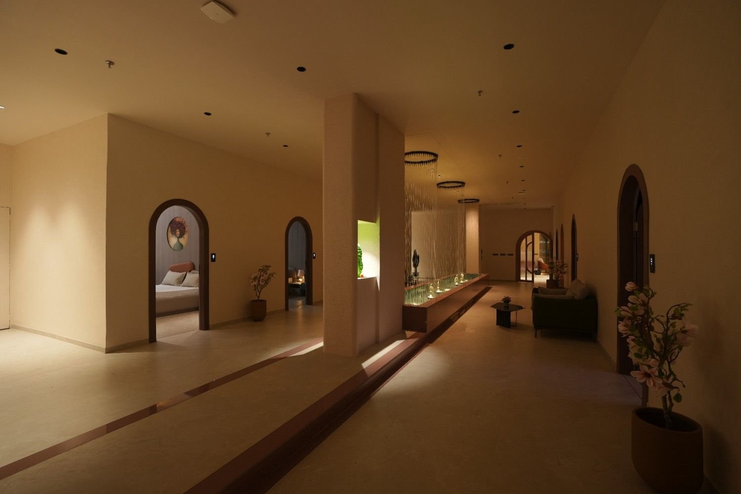 Serene spa hallway with water feature full view at Rivona International Spa
